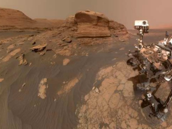 The Curiosity rover apperars in a selfie as it explores Gale Crater on Mars