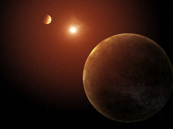 Artist’s concept showing two of the seven planets discovered orbiting a Sun-like star.
