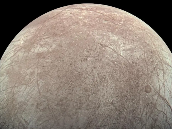 This view of Jupiter's icy moon Europa was captured by JunoCam, the public engagement camera aboard NASA's Juno spacecraft, during the mission's close flyby on Sept. 29, 2022. 