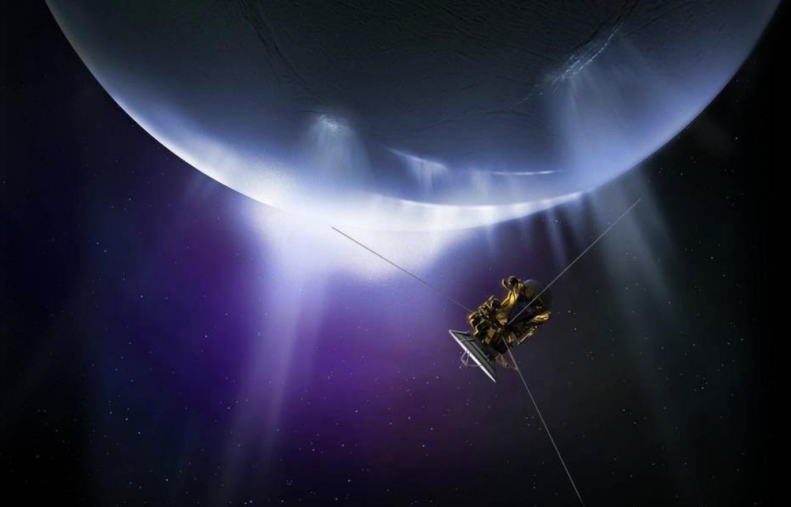 Artist's impression of the Cassini spacecraft flying through plumes erupting from the south pole of Saturn's moon Enceladus.